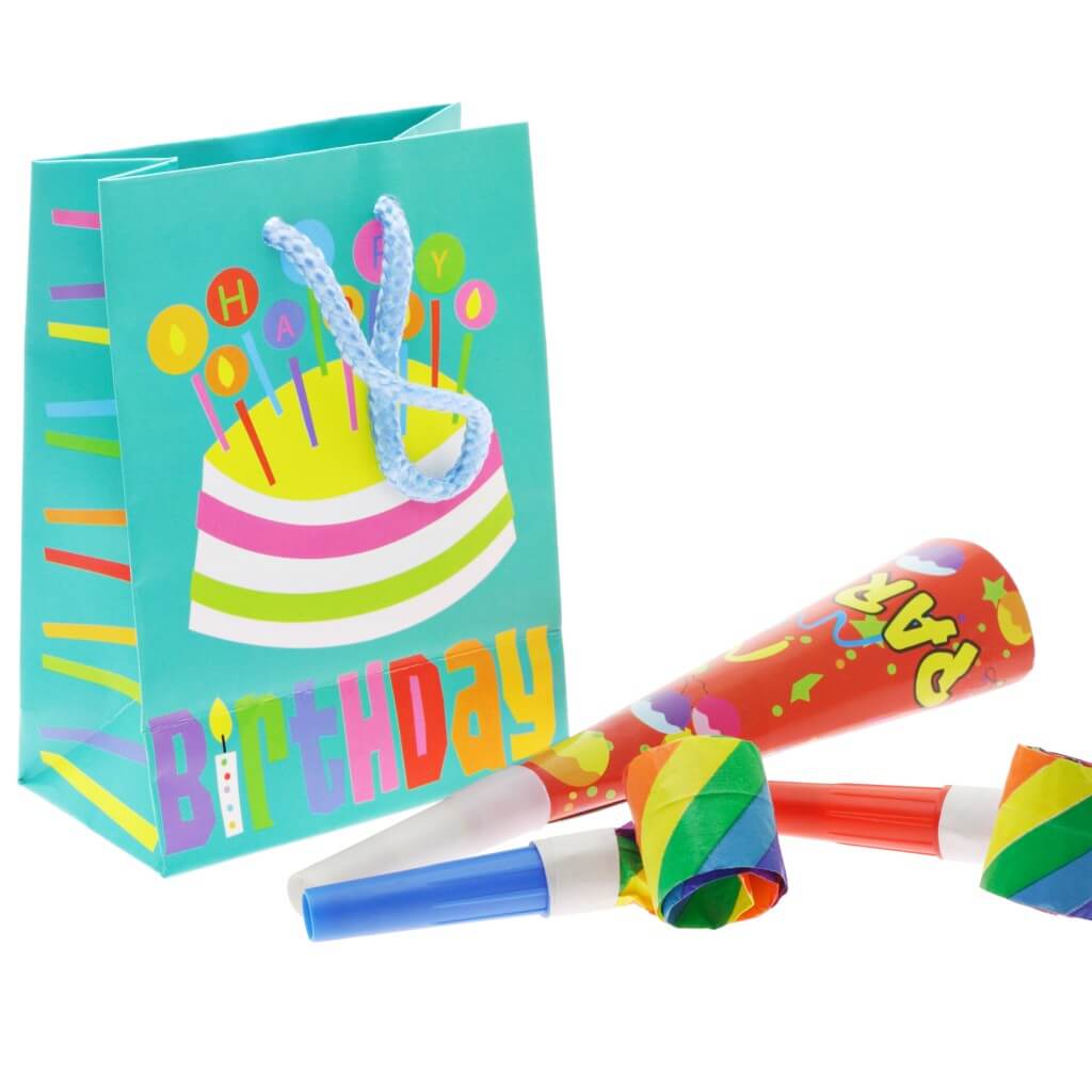 Colorful gift bag and party blowers on white background