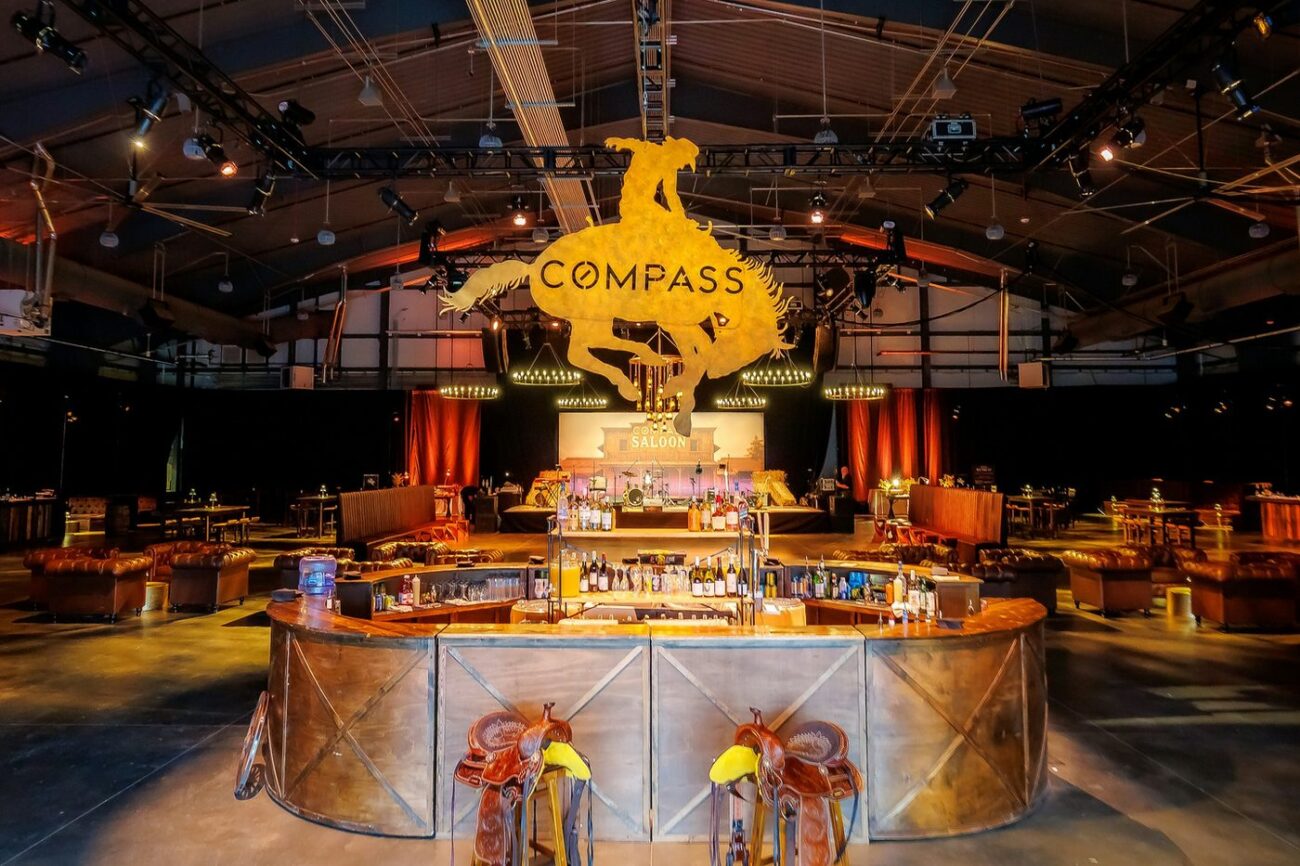 Custom branded Compass Saloon bar with illuminated signage