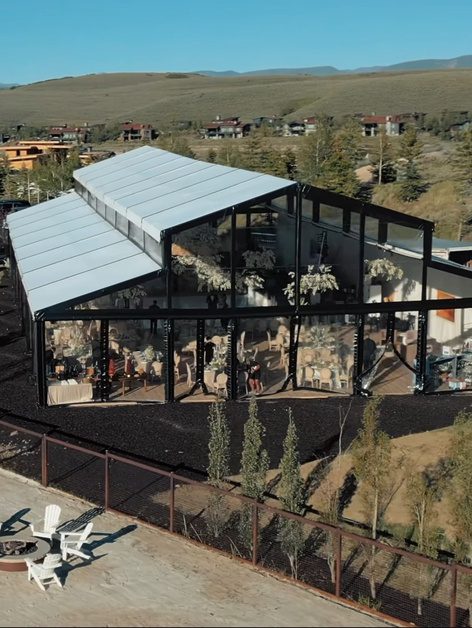 Aerial view of a black frame structure tent installation